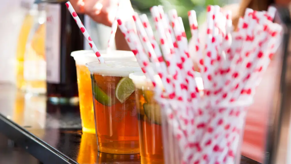 image on Mixed drinks and straws on a bar