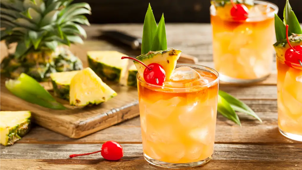 Image of a Homemade Mai Tai Cocktail with Pineapple Cherry and Rum Best Specialty Cocktail Glasses