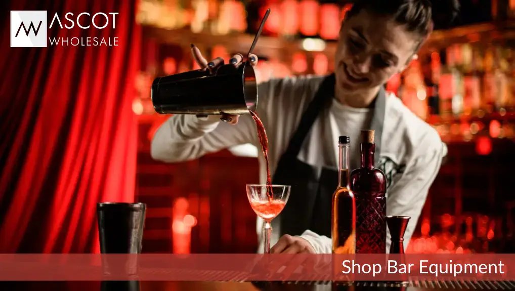 Image of bar equipment with a bartender making drink with a cocktail shaker.