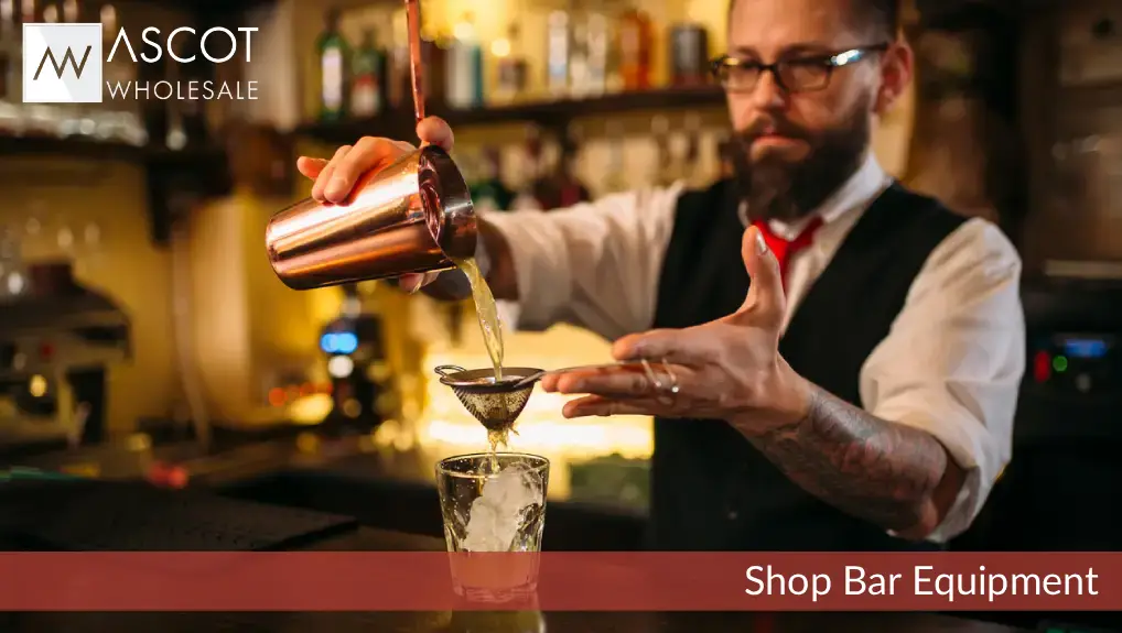 Image of bartender using bar equipment set up.