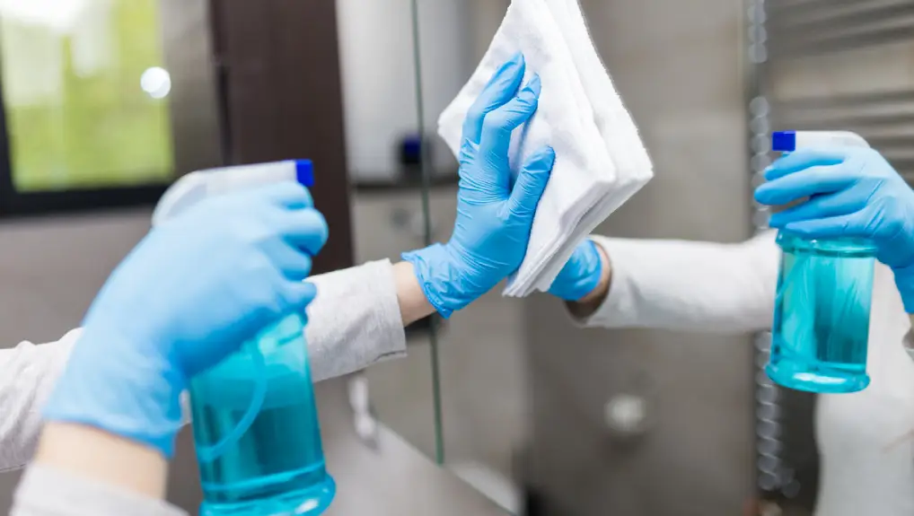 Cloce up image of a worker cleaning bar equipment part of  the daily cleaning tasks