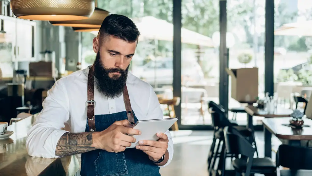 Image of a bartender checking essential equipment and operational costs