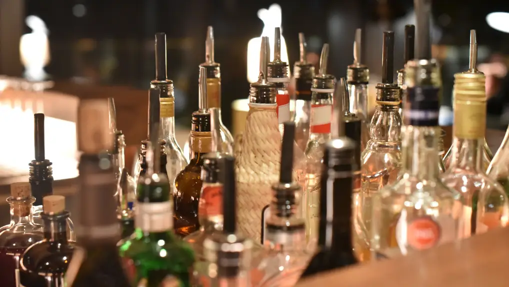 spirits and mixer stock on the bar
