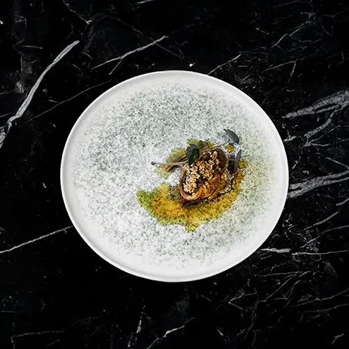 Image of a Plate from Nevilles on a black marble background