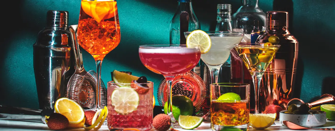 an image of a selection of cocktails (modern and classic) showing the evolution of barware