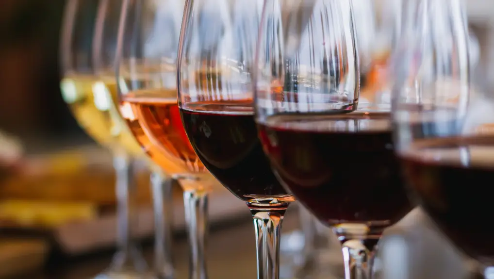 Glassware Materials- an image of a variety of wines in high quality wine glasses
