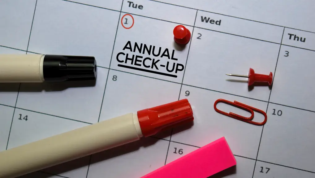 Image of Annual Check-up text on white calendar background