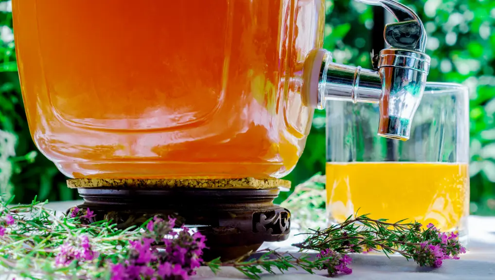 Image of glass drinks dispenser with juice