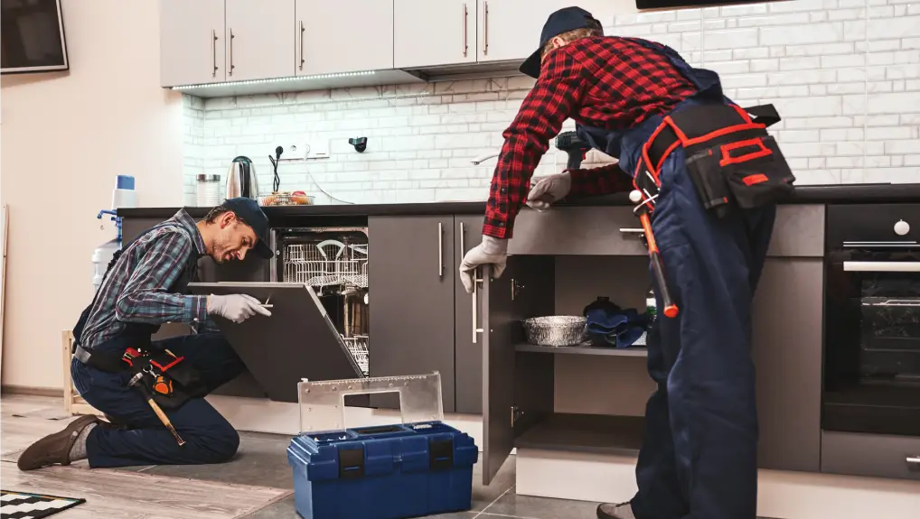 Image of Two men technician senior and young are sitting near dishwasher with screwdriver in kitchen with instruments Senior man teaches young one-
buy commercial catering equipment online uk