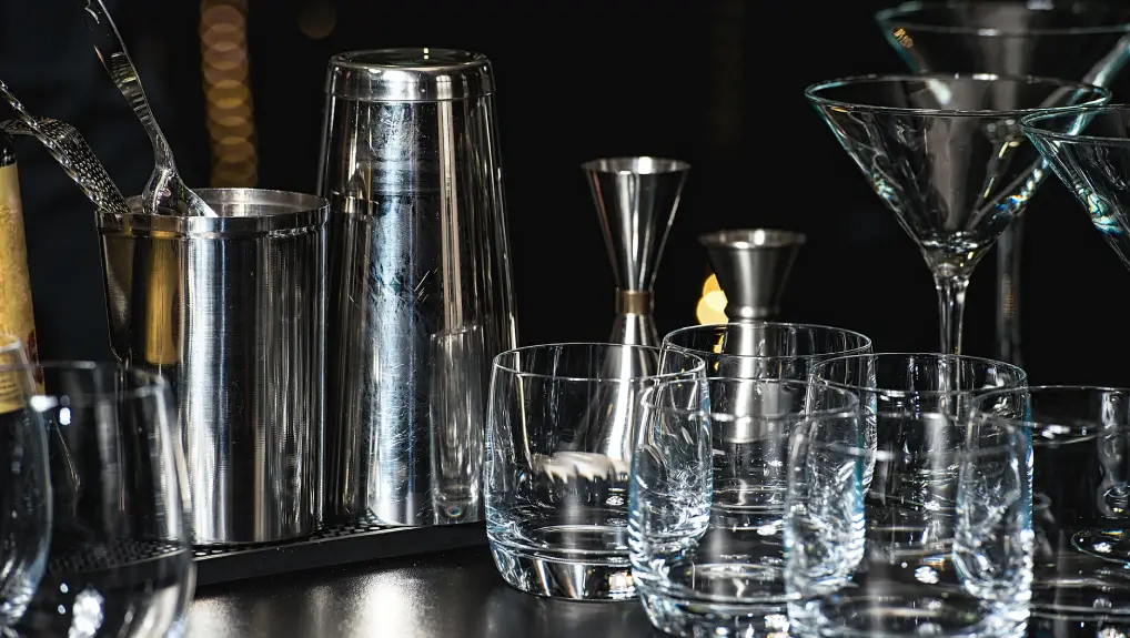 image of Bar dishes and Glasses for a margarita, martini, grog and liqueur on a bar at restaurant, against the bar bar wall background.
Clean store outdoor bar accessories