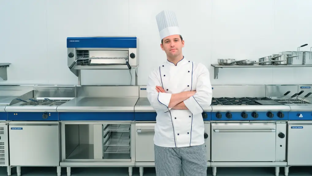 Image of chef with blue seal catering equipment